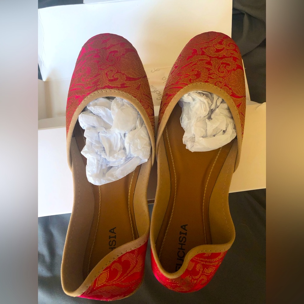 New in box Fuchsia shoes, size 9. Never worn.